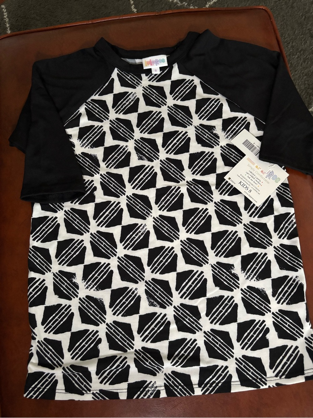 LuLaRoe Black & White Geometric Raglan Tee for Kids size 8